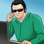 A man wearing dark glasses at a computer