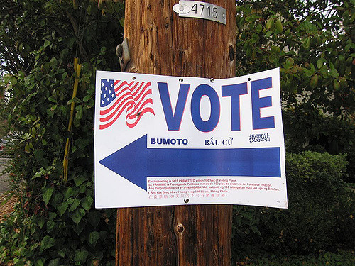 "Vote" sign on telephone pole